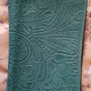 Hand tooled leather wristlet purse
